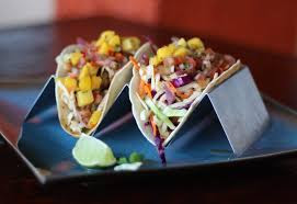 2 bite sized tacos on a V shaped container